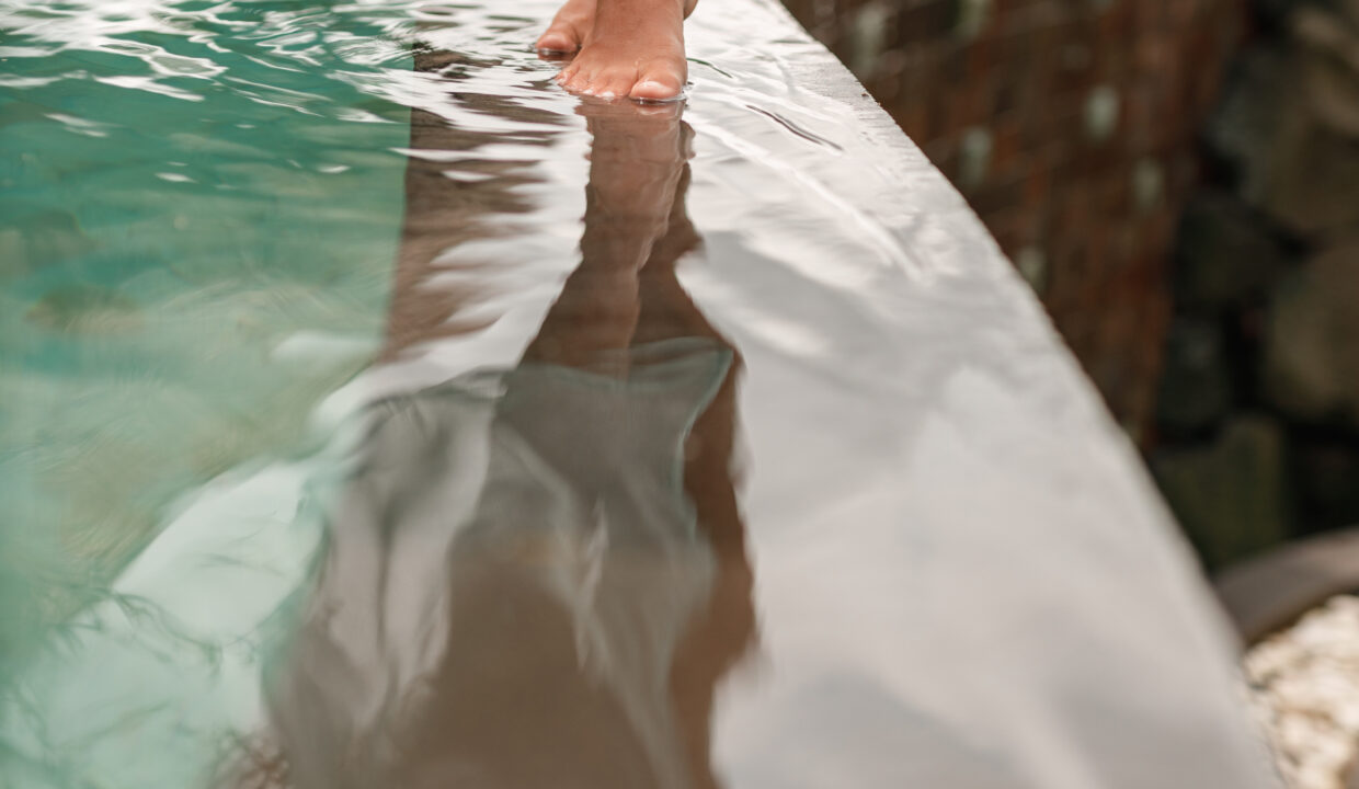 Happy,Young,Woman,In,Long,Dress,Walking,On,The,Edge